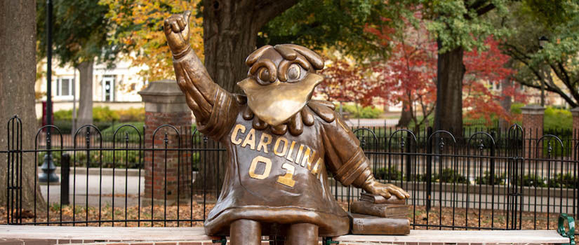 Bronze statue of Cocky giving the "Spurs Up" sign