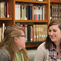 two women in library