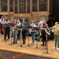 Jazz students perform on stage.