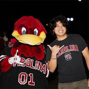 Lukas Balatbat poses with Cocky at Tigerburn.